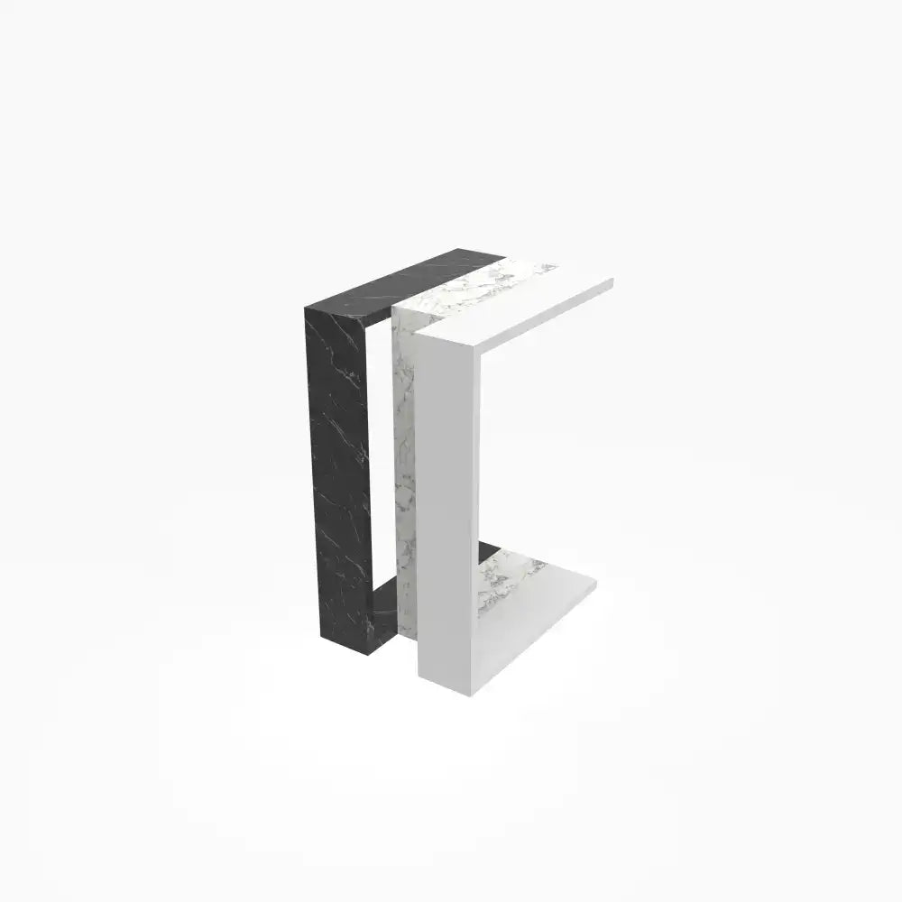C-shaped side table with black and white marble-look panels and open side shelf