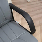 Close-up of grey padded armrest on an office desk chair