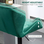 Green velvet bar stool armrest detail with height-adjustment handle and black metal stem