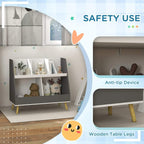 Grey kids storage shelf with two rows of open compartments and wooden table legs