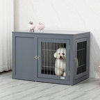 Grey dog crate end table with double doors and front wire-bar opening, small dog inside