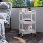 White three-tier trolley for small spaces with rolling casters and open shelves