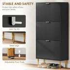 Black shoe cabinet with steel legs and adjustable foot pads, gold pull handles.