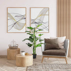 Artificial monstera tree in black nursery pot