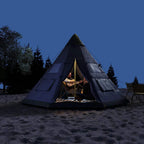 Grey 6-person tipi tent lit at night with open doorway