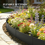 Black metal garden fence edging with adjustable angle, flower border.