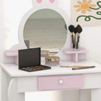 White and pink kids vanity table with bunny mirror, makeup brushes, and drawer