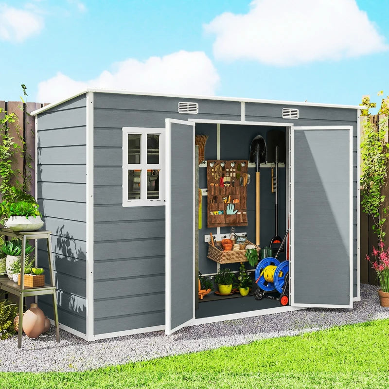 Grey resin shed with open double doors, side window, and built-in shelving.