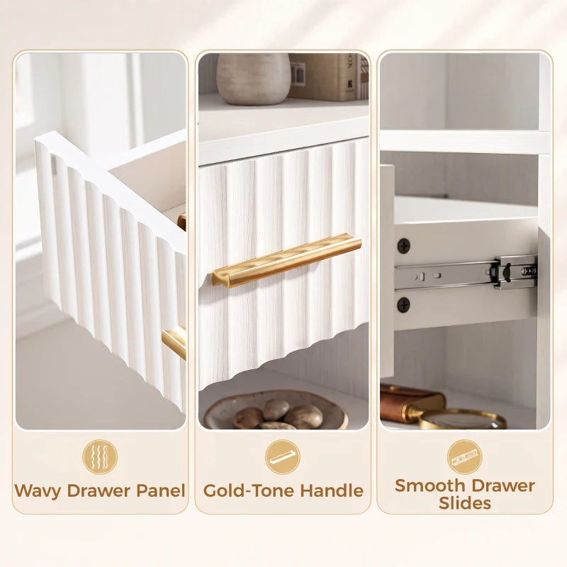Close-up of white drawer front with gold-tone handle and smooth slide