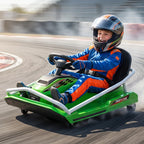 Green electric go-kart drifting with black seat, steering wheel, and tires