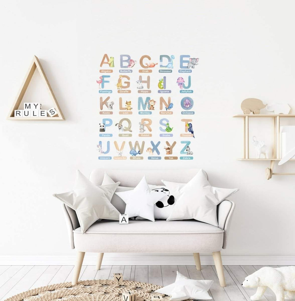 Alphabet and animal wall stickers above couch, colorful letters and animal icons