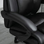 Black PU leather padded armrest and seat cushion on a swivel office chair
