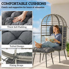 Egg chair with thick tufted light grey cushions and secure fixing straps