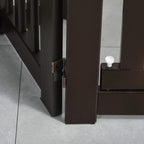 Close-up of dark brown folding dog gate hinge and support feet