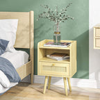 Light wood bedside table with open shelf, rattan drawer front, and round knob on legs