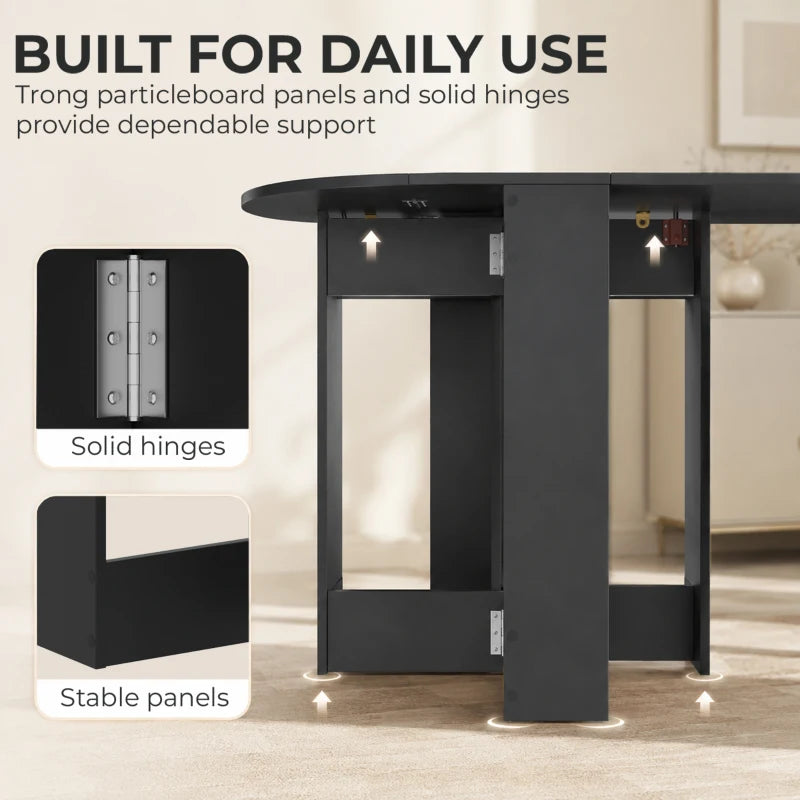 Black folding dining table with drop-leaf design and sturdy hinged panel construction