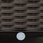Close-up of brown woven rattan-style planter side with a round drainage outlet