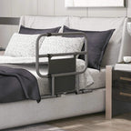 Black bed assist rail on a couch bed with a storage pocket panel at the front.