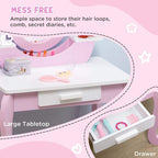Pink kids dressing table set with curved vanity top, open drawer, and accessories