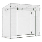 White walk-in garden greenhouse with green roll-up doors and window panels