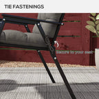 Charcoal grey patio chair cushion secured with tie fastenings