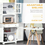 White kitchen cupboard interior with open shelves, framed glass doors, and drawer storage