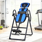 Foldable gravity inversion table with blue padded headrest and backrest plus ankle supports