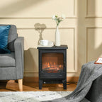Black electric fireplace stove standing on the floor with LED flame behind glass