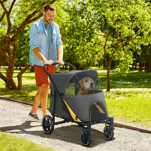 Foldable pet stroller, dark grey with yellow trim, side view on wheels