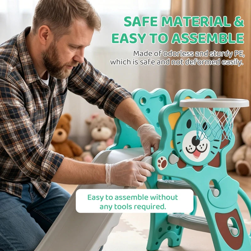 Adult assembling teal kids slide with lion basketball hoop and sturdy base