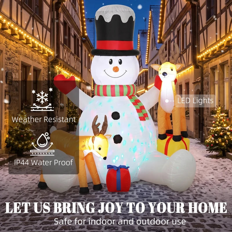 LED inflatable snowman with striped scarf and two reindeer figures in a standing pose