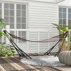 Black hammock stand with striped hammock net and wooden deck base