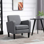 Grey upholstered accent chair with curved arms and dark legs
