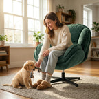 Dark green velvet wingback swivel accent chair with black four-star base, armrest view