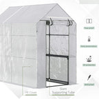 White walk-in greenhouse with open door and two-tier shelves on support tubes
