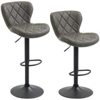 Set of 2 dark grey bar stools with diamond tufted backrests, swivel seats, footrests