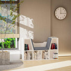 White cube bookshelf with built-in gray cushioned seat for reading