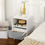 White nightstand with open shelf and gray drawer, plus light wood legs
