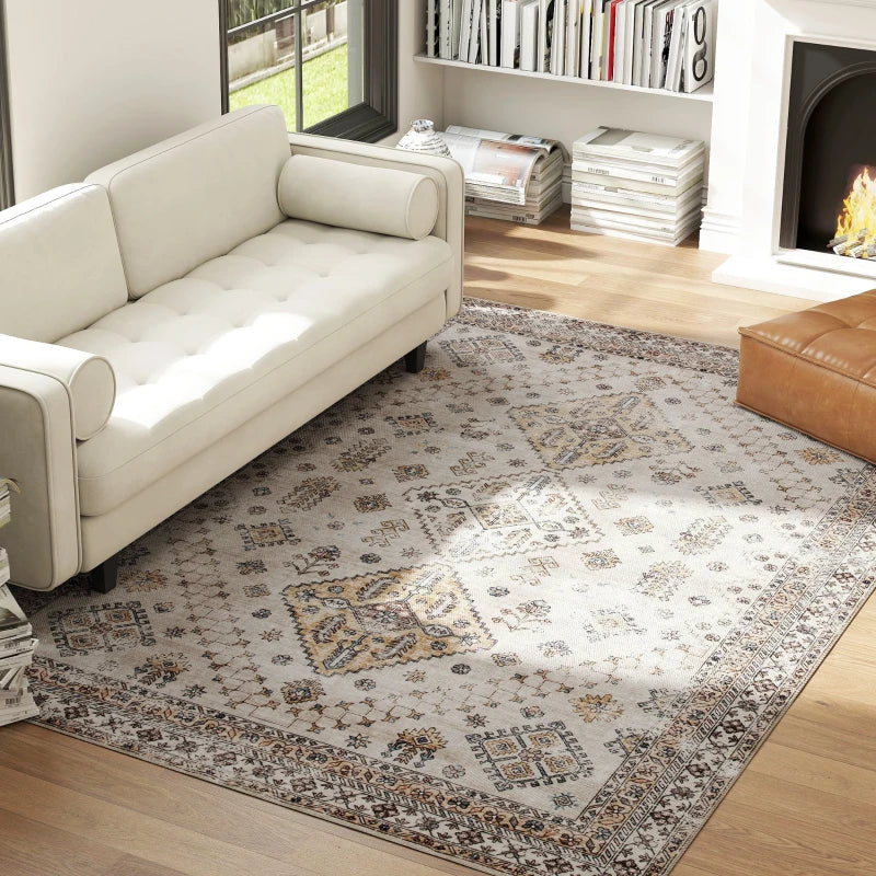 Beige vintage area rug in living room, ornate medallion pattern with decorative border