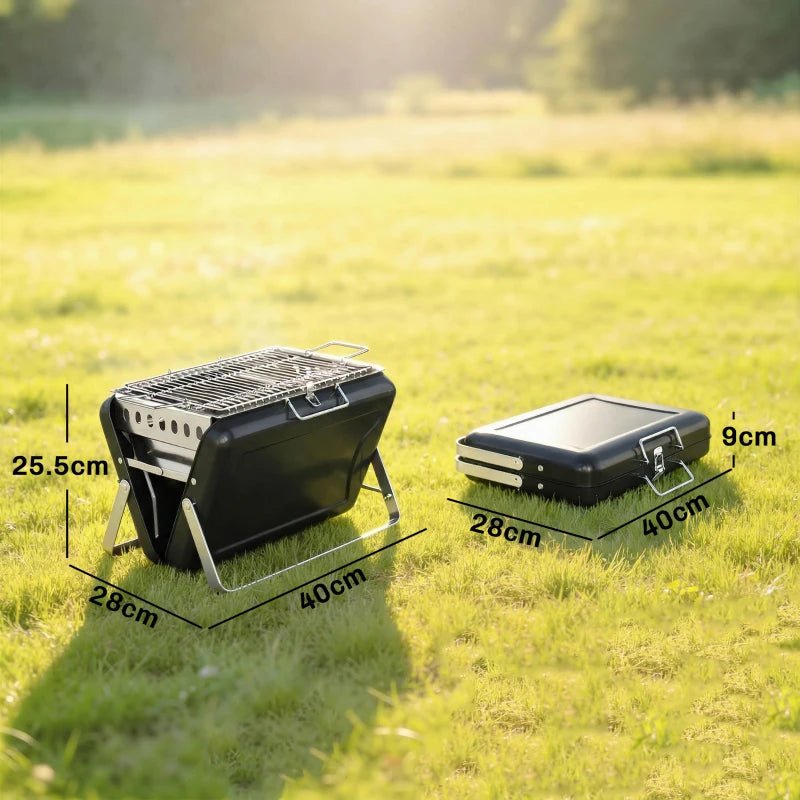Folded portable charcoal grill on legs with hinged lid and chrome cooking grate