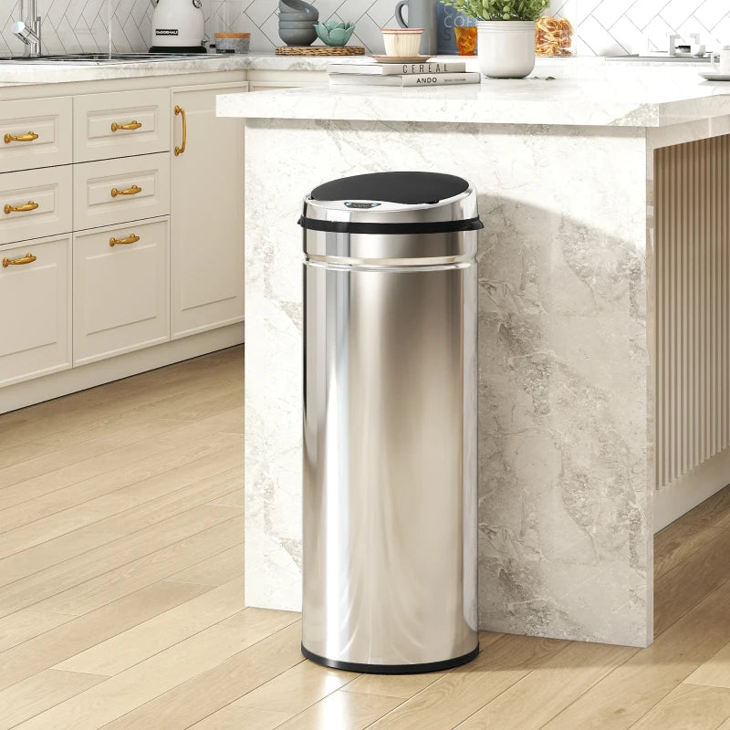 Silver stainless steel sensor trash bin with round black top lid