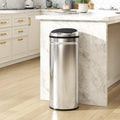 Silver stainless steel sensor trash bin with round black top lid