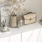 White shoe cabinet with top surface decor and two front doors