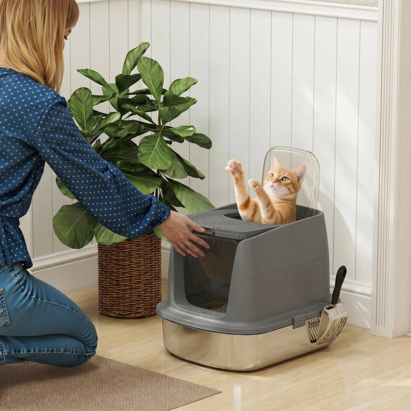 Dark grey enclosed cat litter box with open top lid and front-entry door, scoop attached
