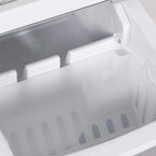 Ice maker ice basket tray with molded slots for forming cube ice