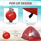 Red pop-up beach tent with carry bag shown and ground stakes for setup