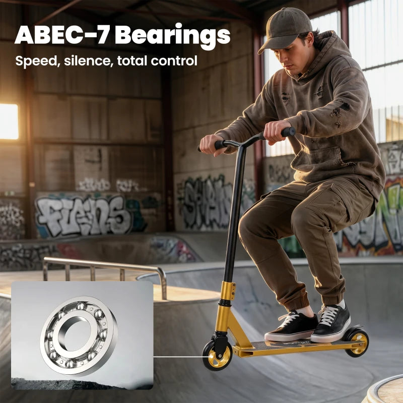 Gold-tone stunt scooter with black grips and front wheel bearing detail