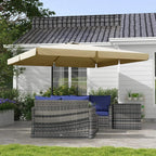Khaki cantilever patio parasol open above outdoor lounge set against house wall