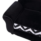 Black pet sofa bed corner view with padded arm and chevron cushion panel