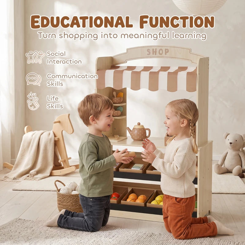 Children pretending to shop at a wooden play shop with striped awning and cash register